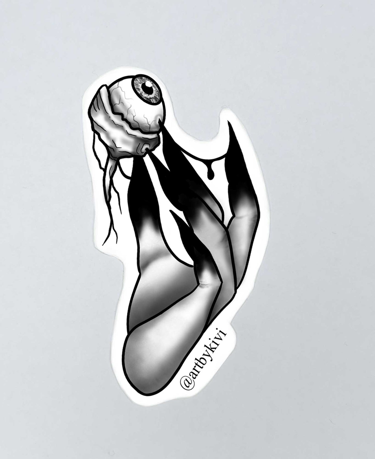 Hand holding eyeball