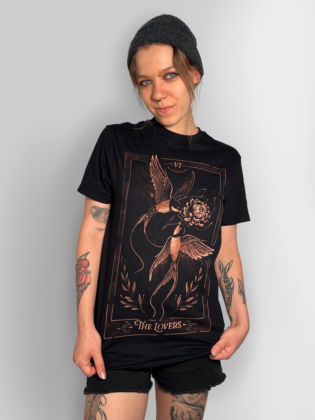 Hand-painted bleach art t-shirt of The Lovers tarot card, featuring two birds in flight sharing a flower