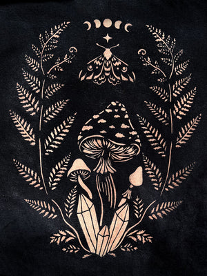 Mushroom and fern stencil design bleach painted on dark fabric