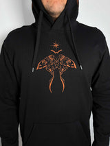 A black pullover hoodie with a prominent orange moth graphic and star design on the chest, shown on a model.