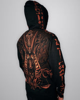 Side view of the Anubis hoodie on a model, with the hood up showing hieroglyphs down the hood and sleeve