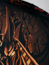 Close-up of the bleach-painted linework and splatter texture on the back of the Anubis hoodie, with hieroglyphs on the sleeve