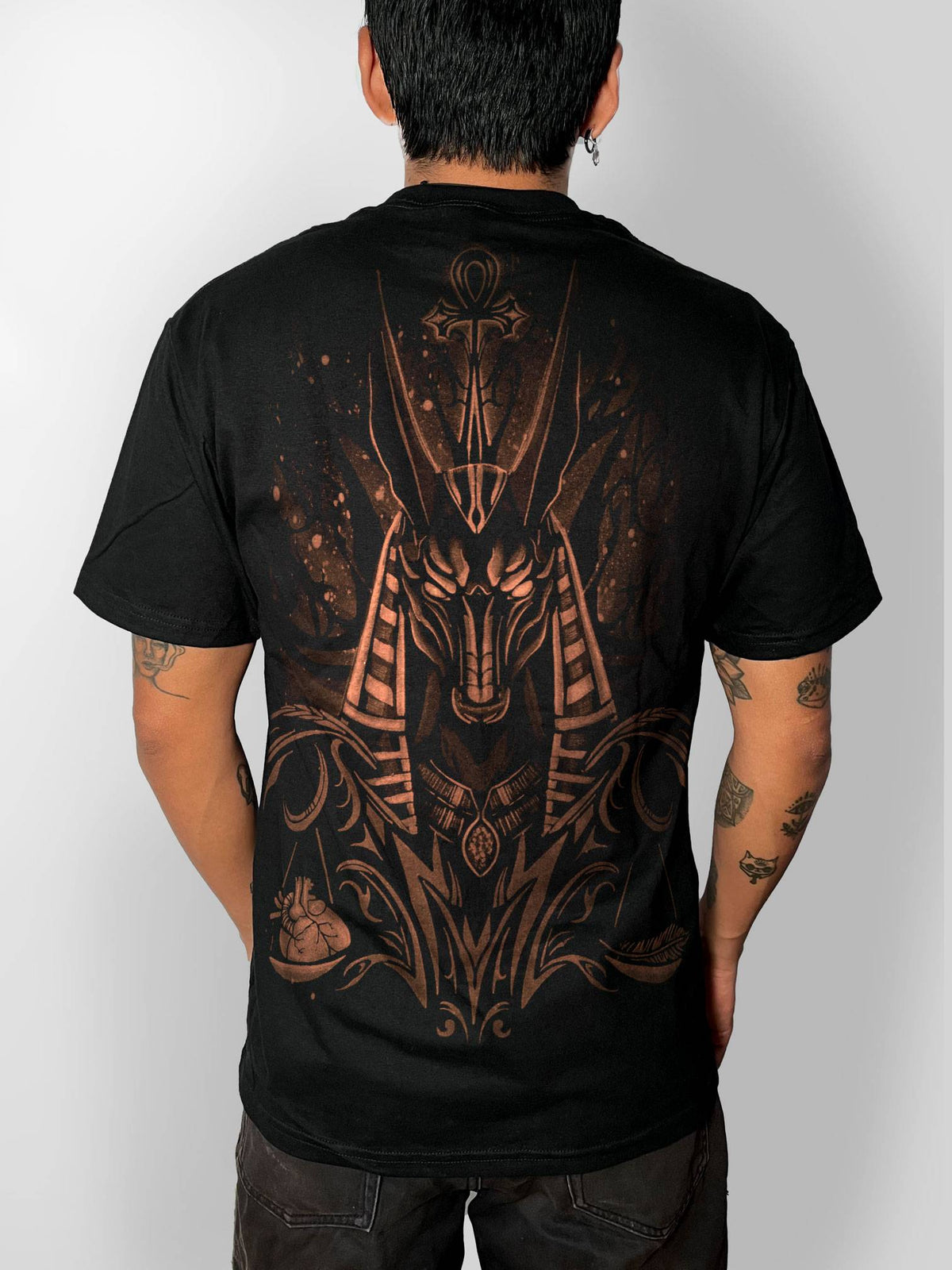 Anubis hand bleach-painted black t-shirt, back view on a model