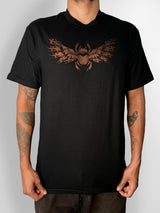 Anubis hand bleach-painted black t-shirt, front view on a model with a winged scarab on the chest