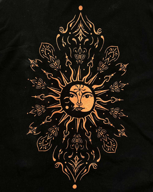 Sun and moon mandala design bleach painted on fabric