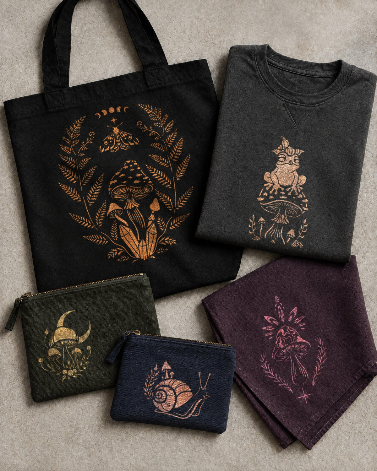 Forest Mushroom Stencil Pack designs bleach-painted on a tote bag, t-shirt, napkin and zip purses